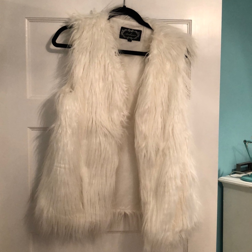 furry white vest
